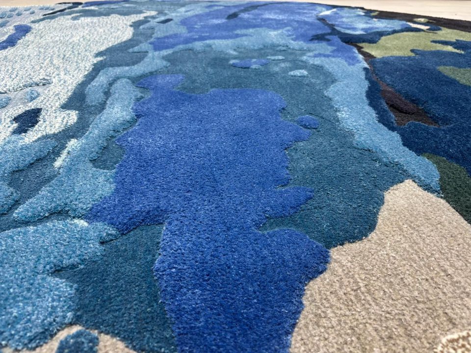 Close-up of blue toned rug texture