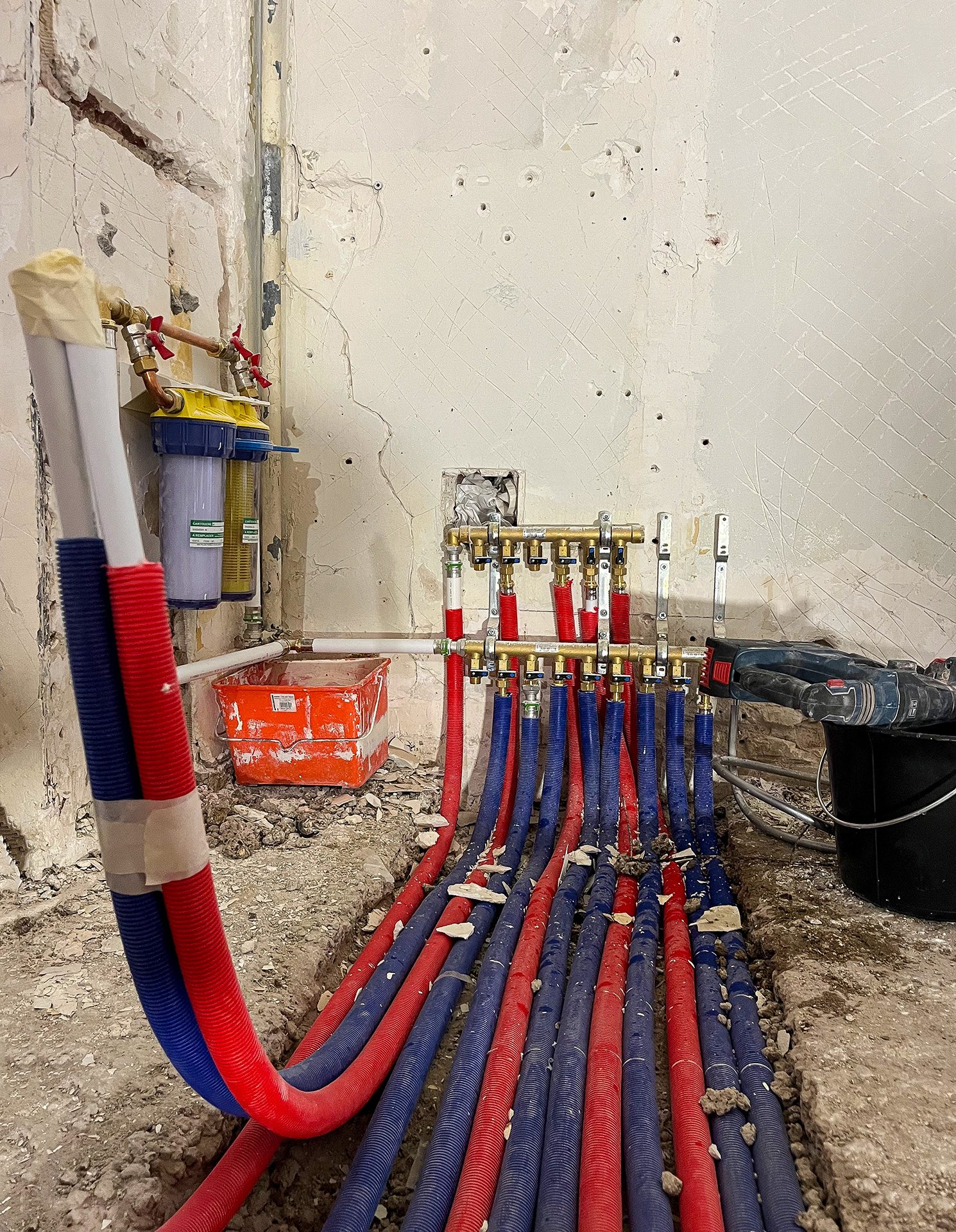 Travaux préparatoires et distribution des réseaux dans un appartement en transformation