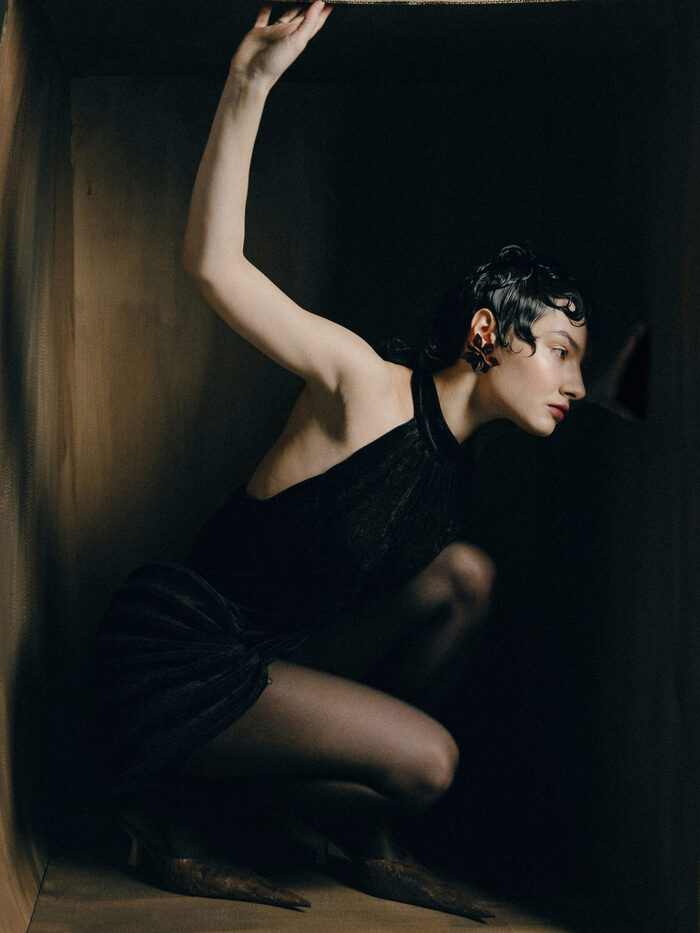 Artells Magazine fashion editorial with sculptural black styling