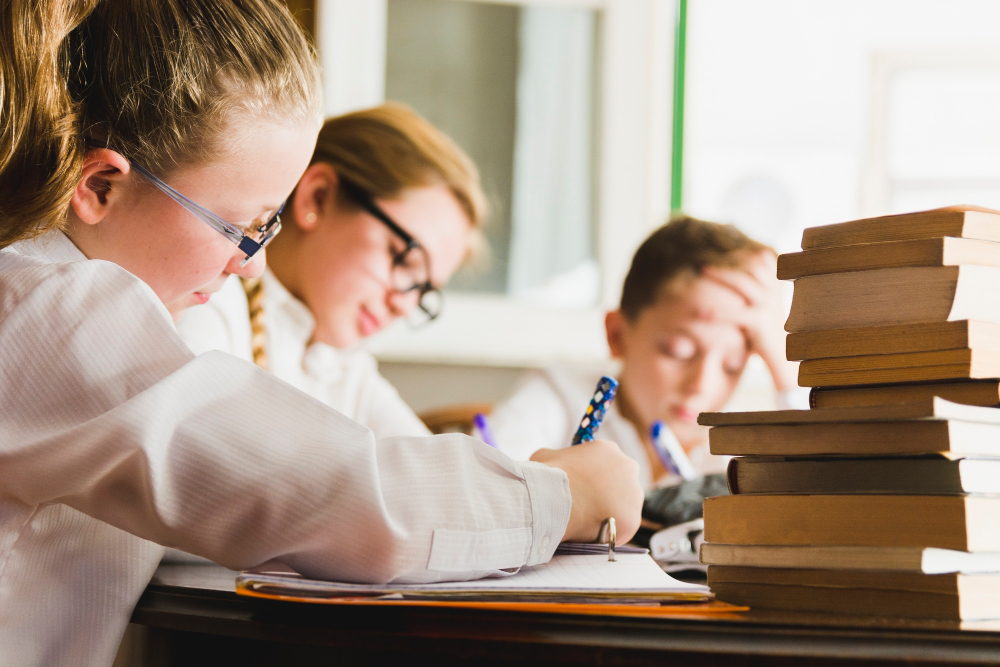Children are doing assignments in class.
