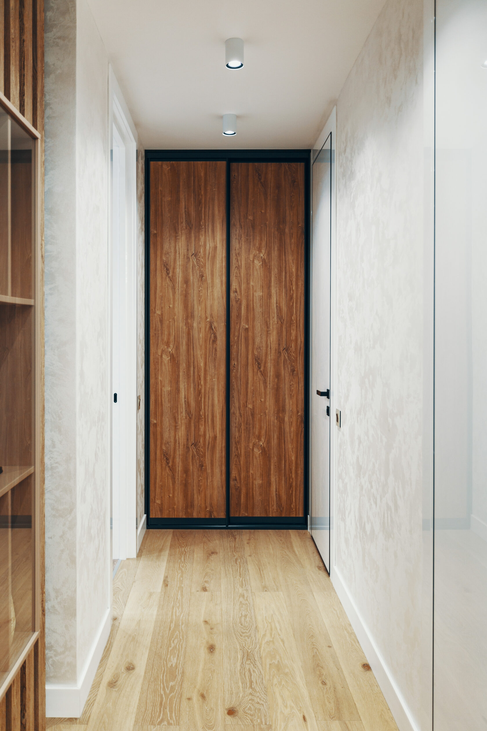 Встроенный шкаф-купе в нишу с древесным заполнением дверей-купе и системой-купе в декоре графит