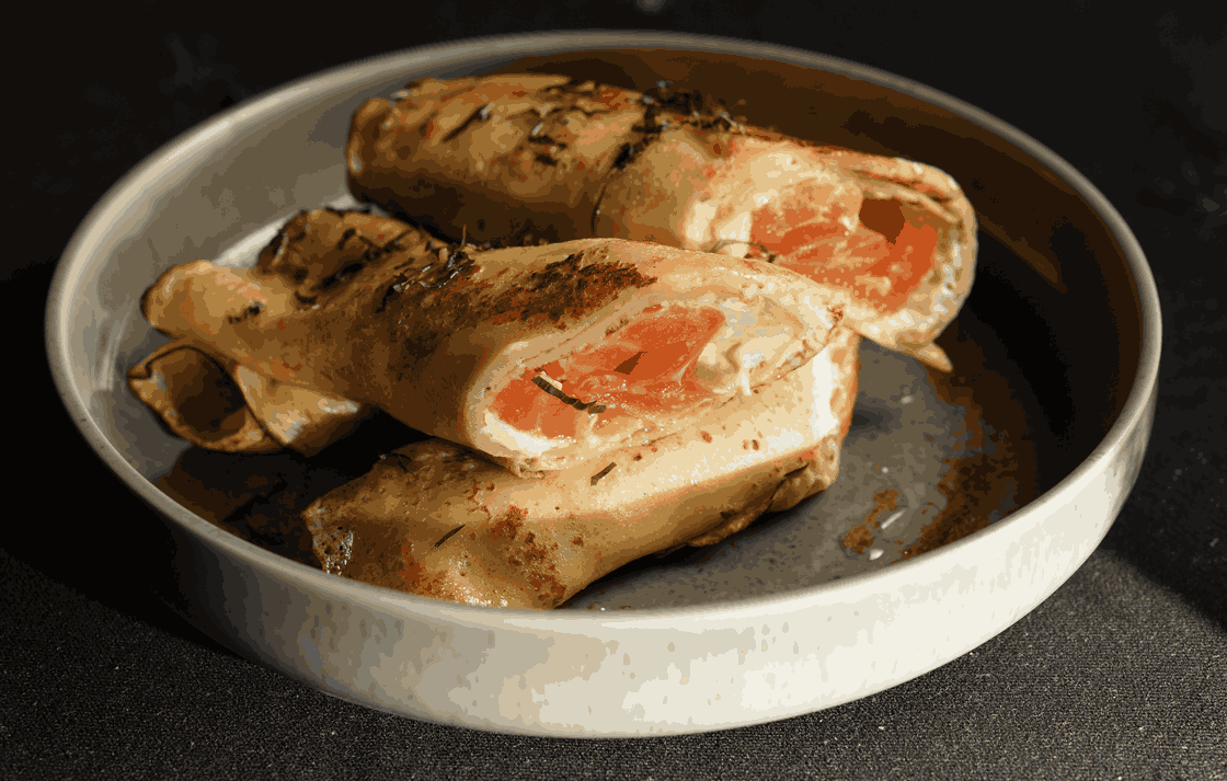 The sophisticated Crepes Salted Salmon dish, proving that halal food in Ubud can be both unique and gourmet.