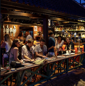 Relaxing beach club atmosphere in Nusa Lembongan with sunset cocktails and pool