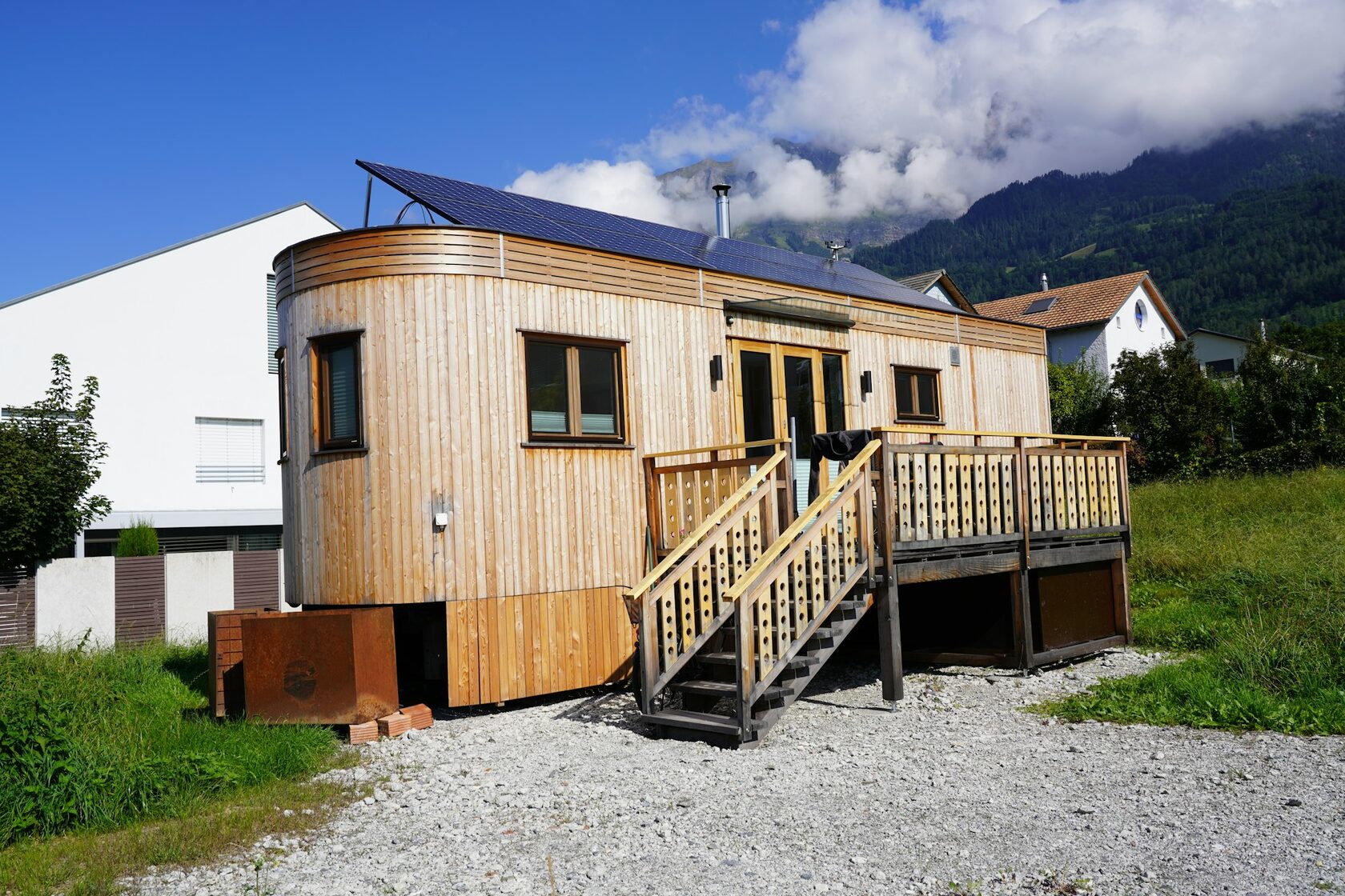 A small wooden home in a warm setting