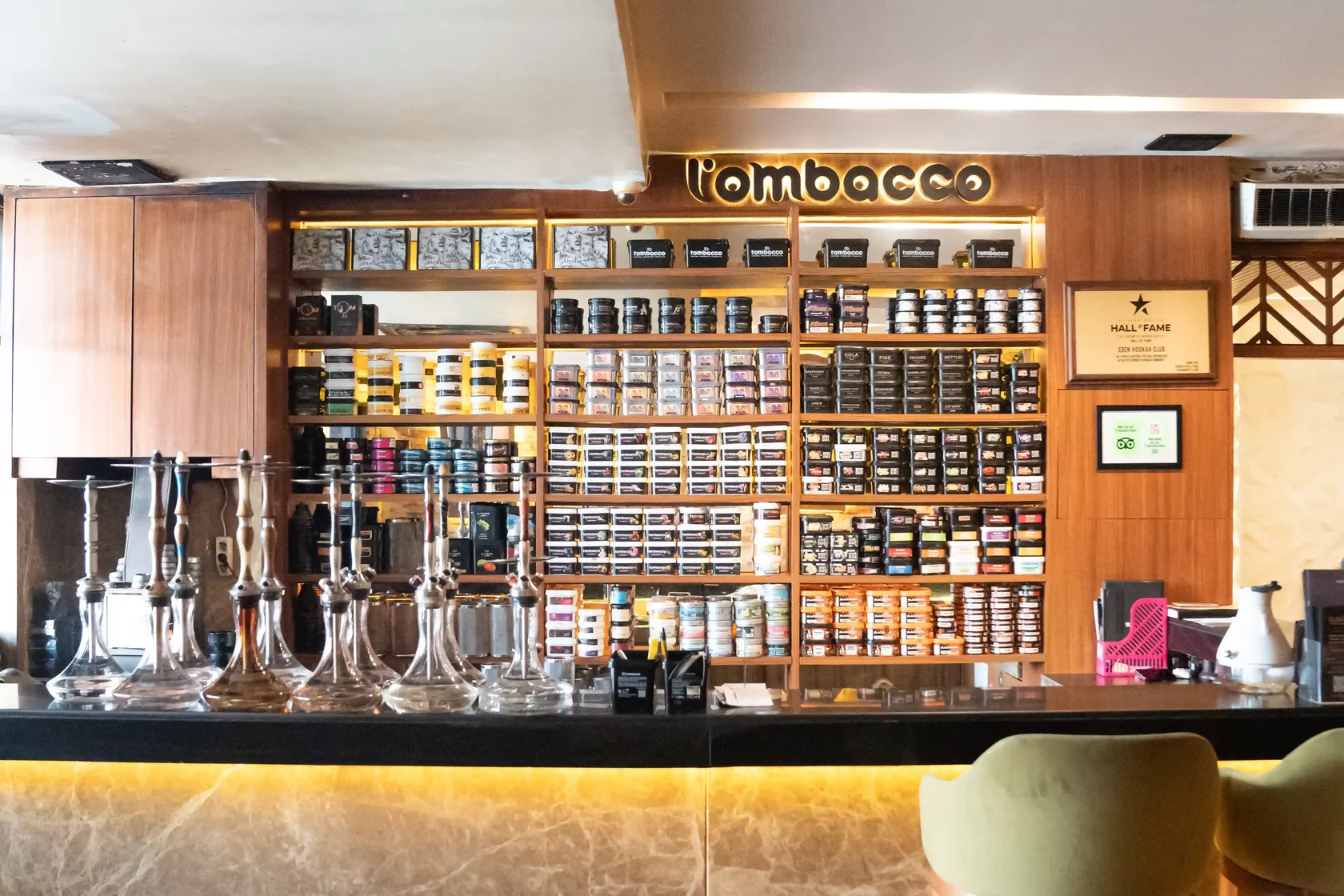 200+ shisha flavours displayed at Eden Hookah Club across different tobacco lines
