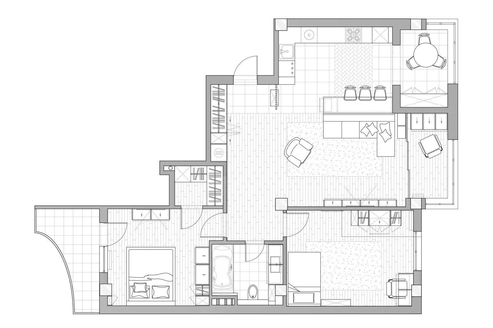 Plan d’un appartement de trois pièces avec une grande pièce de vie et cuisine ouverte, ainsi que des rangements intégrés et discrets dans l’entrée et la chambre
