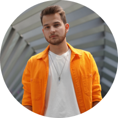 Portrait of Dmitry Baleshev standing inside the pedestrian bridge