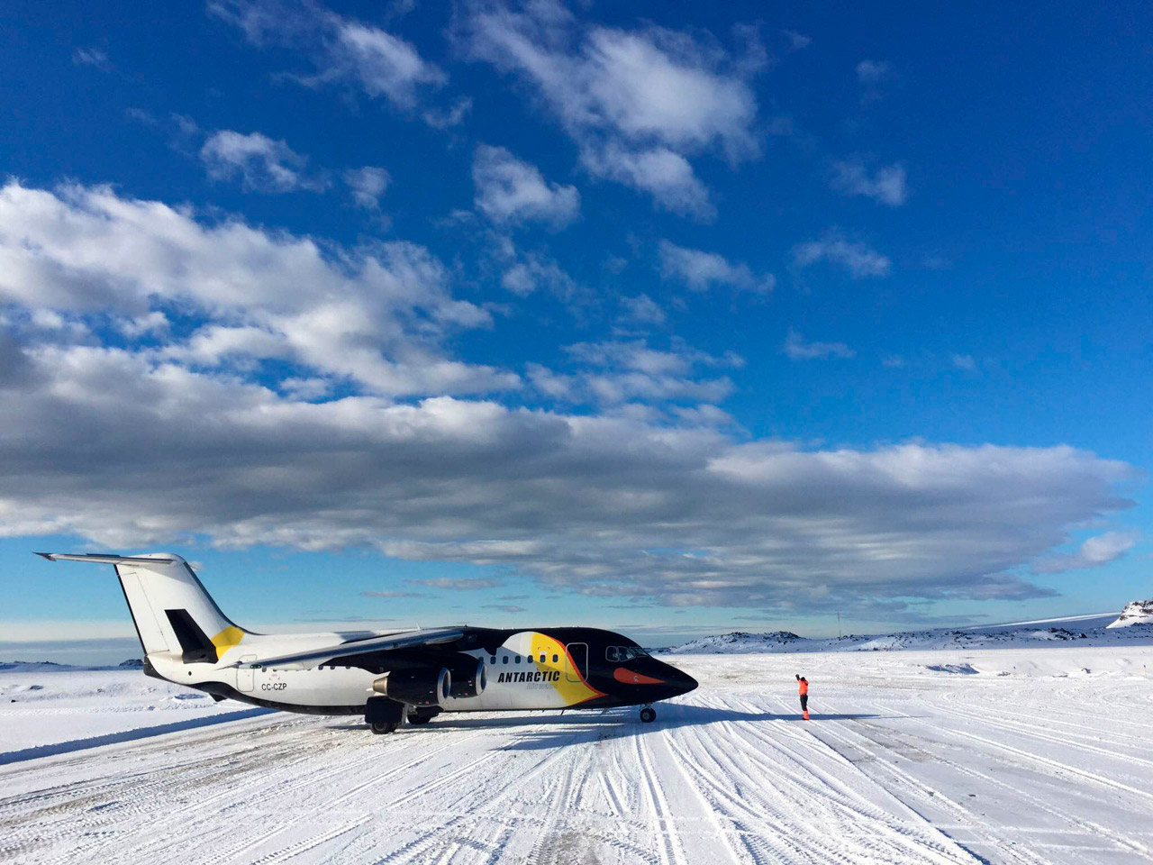 Antarctica flight landing on a snowy runway offering a fast way to reach the White Continent for an Antarctic expedition