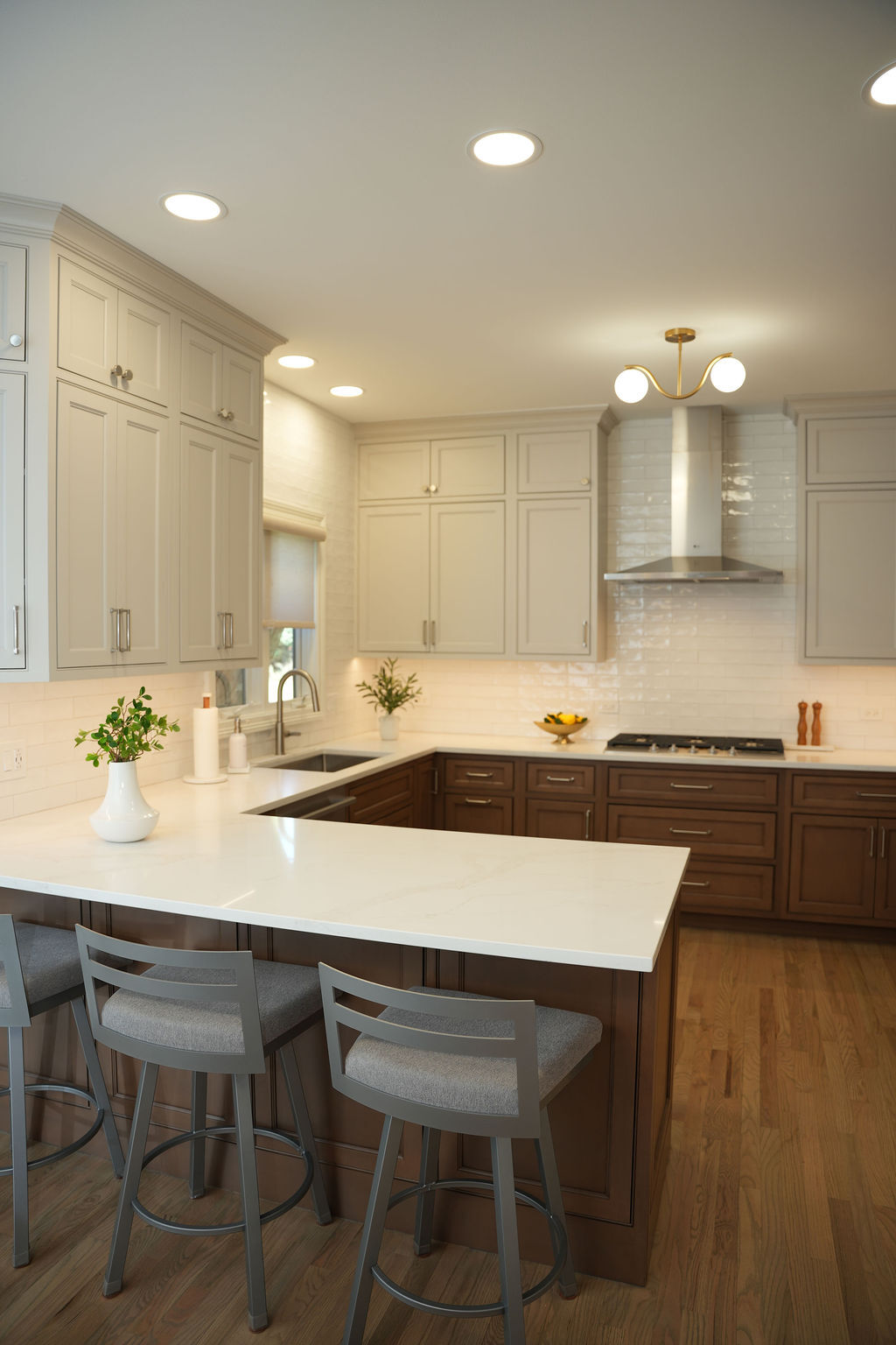 Remodeled kitchen in Naperville with custom cabinetry and stone countertops