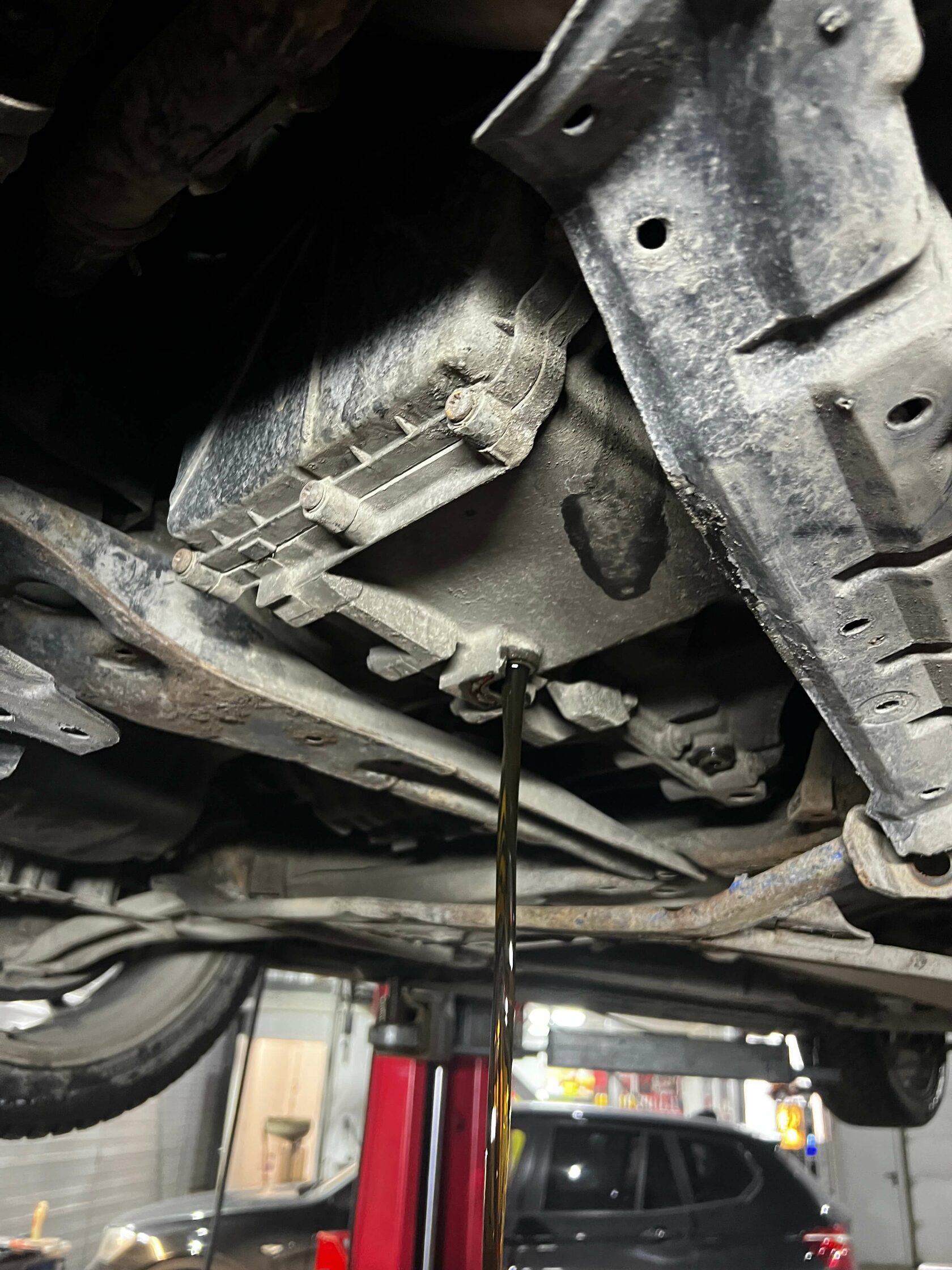 Слив масла из передней секции робота