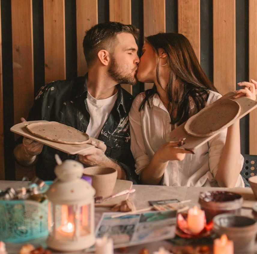 During this baby gender reveal nyc pottery experience, couples create a ceramic piece before the reveal moment.