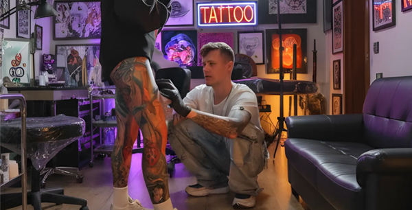 Tattoo artist Rinat Tattarin Mingazdinov creates a realistic tattoo at a studio in Los Angeles, West Hollywood.