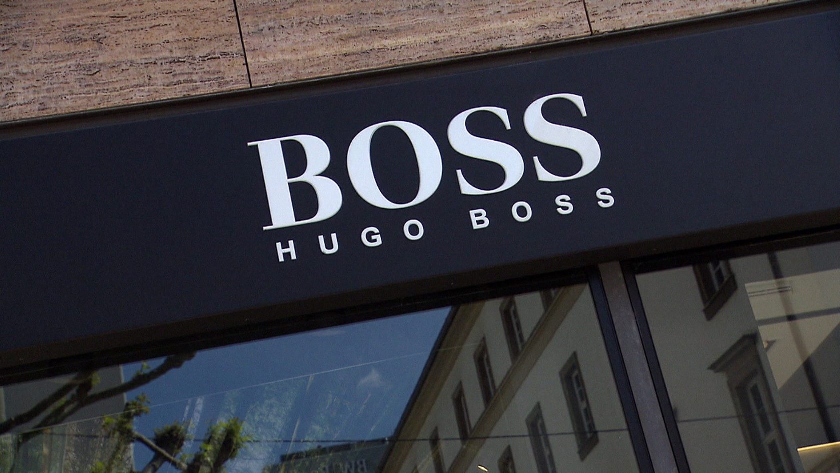 Hugo com. Завод Хьюго босс. Hugo Boss логотип. Хуго босс обои. Разделение Hugo, Boss.
