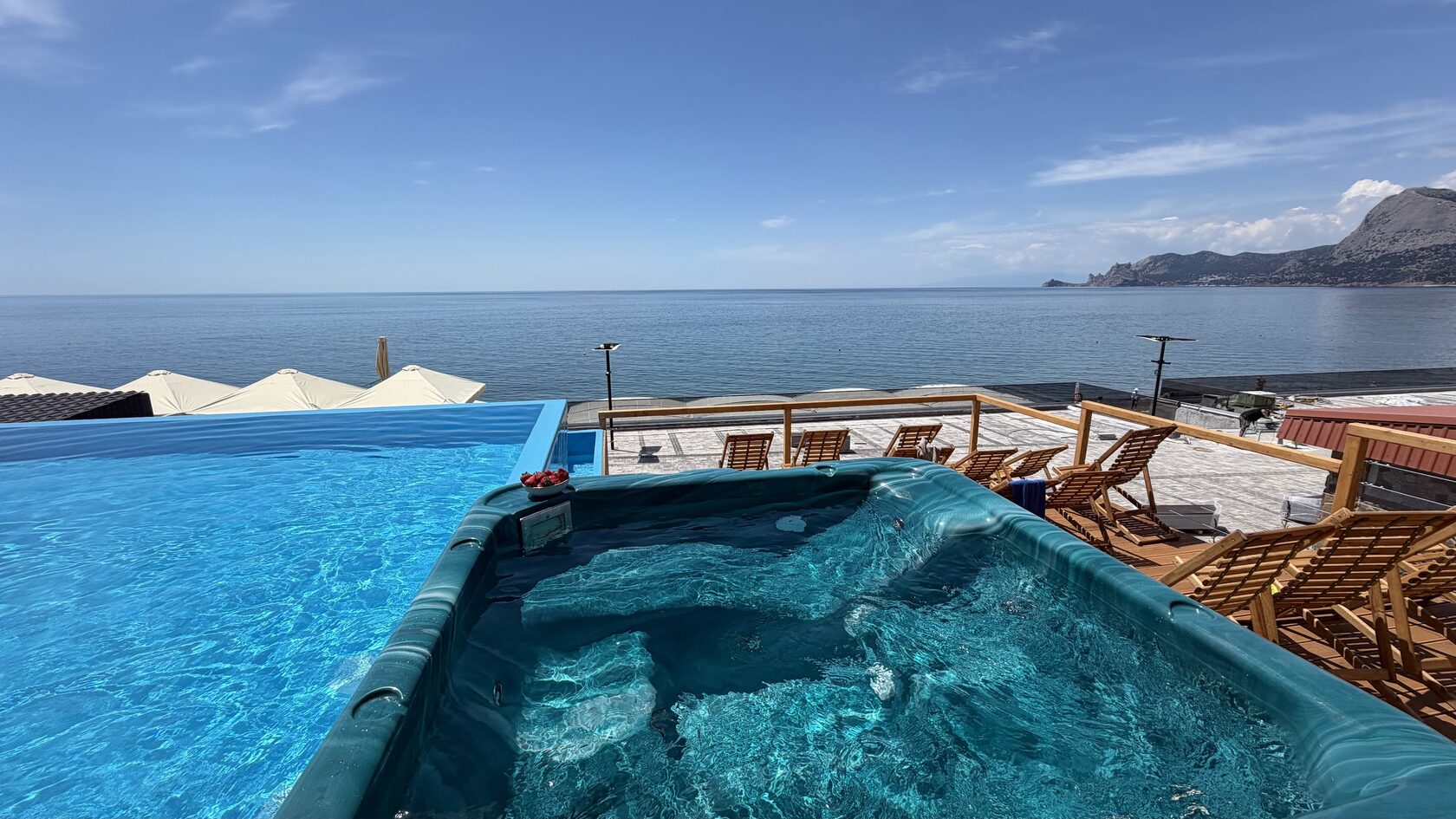 Infinity pool blending with the sea horizon