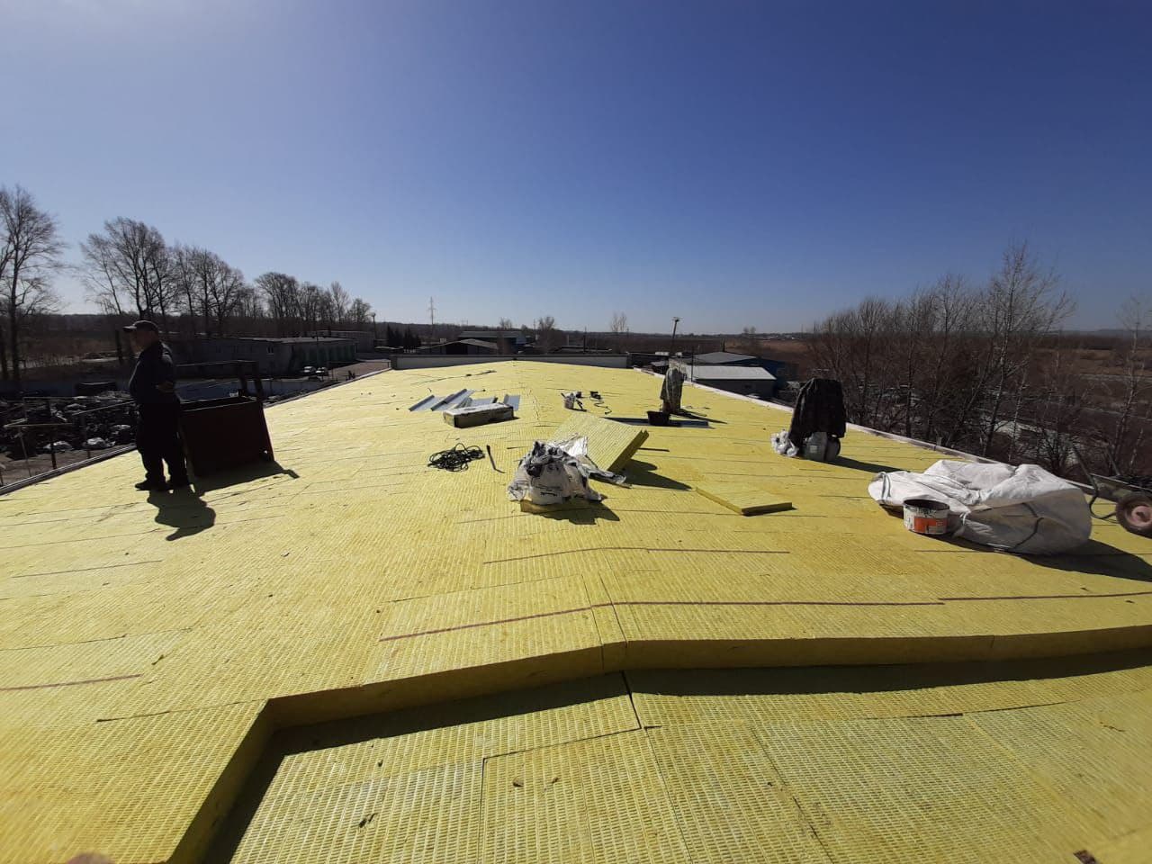 укладка утеплителя на кровле, капитальный ремонт кровли