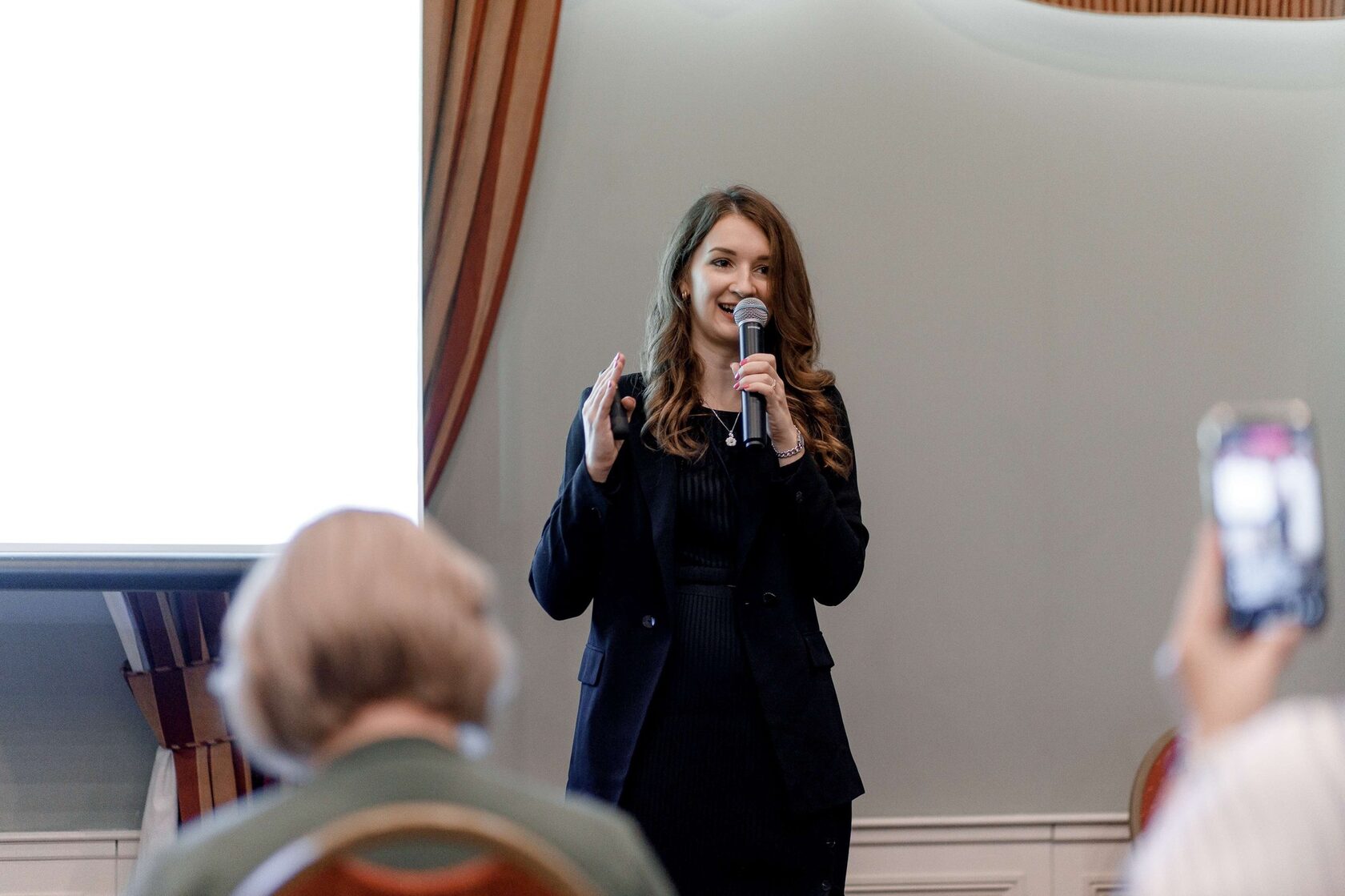 Maria Guryeva speaking to an audience