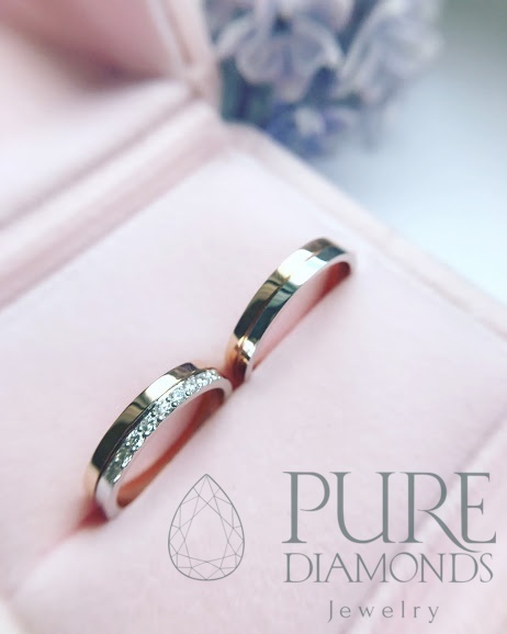 Двухцветные обручальные кольца из белого и розового золота с бриллиантами