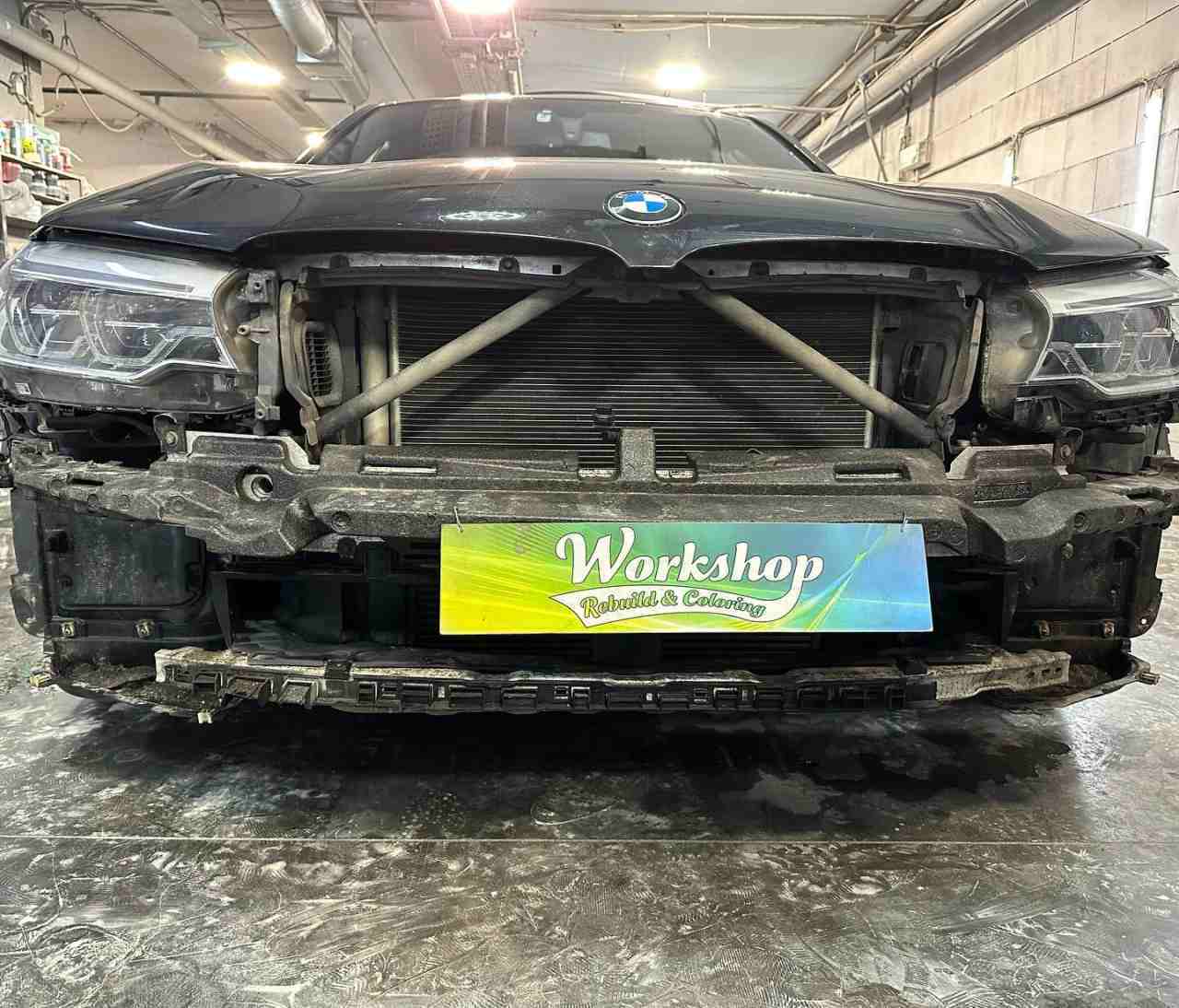 Покраска чёрного бампера BMW