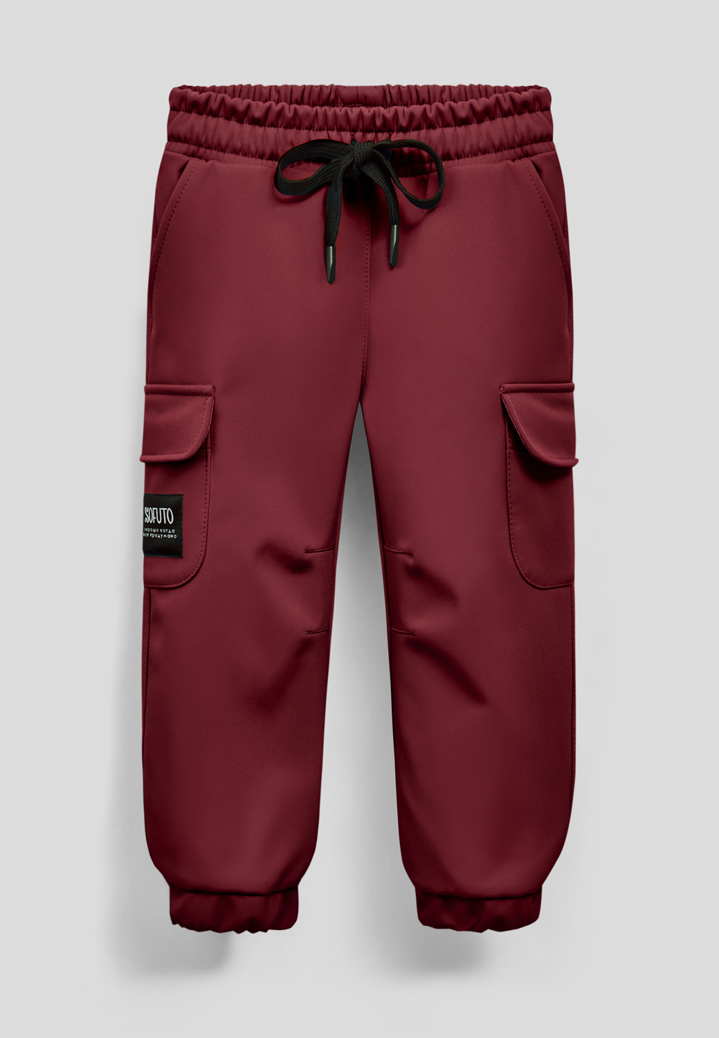 бордовые спортивные штаны на сером фоне 