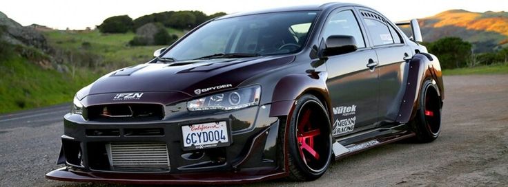 Описание: седан с широкими крыльями, спортивным обвесом и заниженной подвеской.