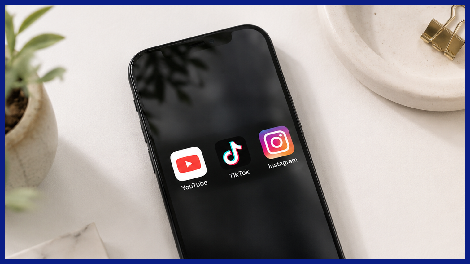Smartphone with YouTube, TikTok, and Instagram, illustrating cross-platform content sharing.