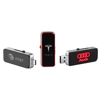 USB-флешки с полноцветными логотипами AT&T, Tesla, Audi, напечатанные УФ-способом