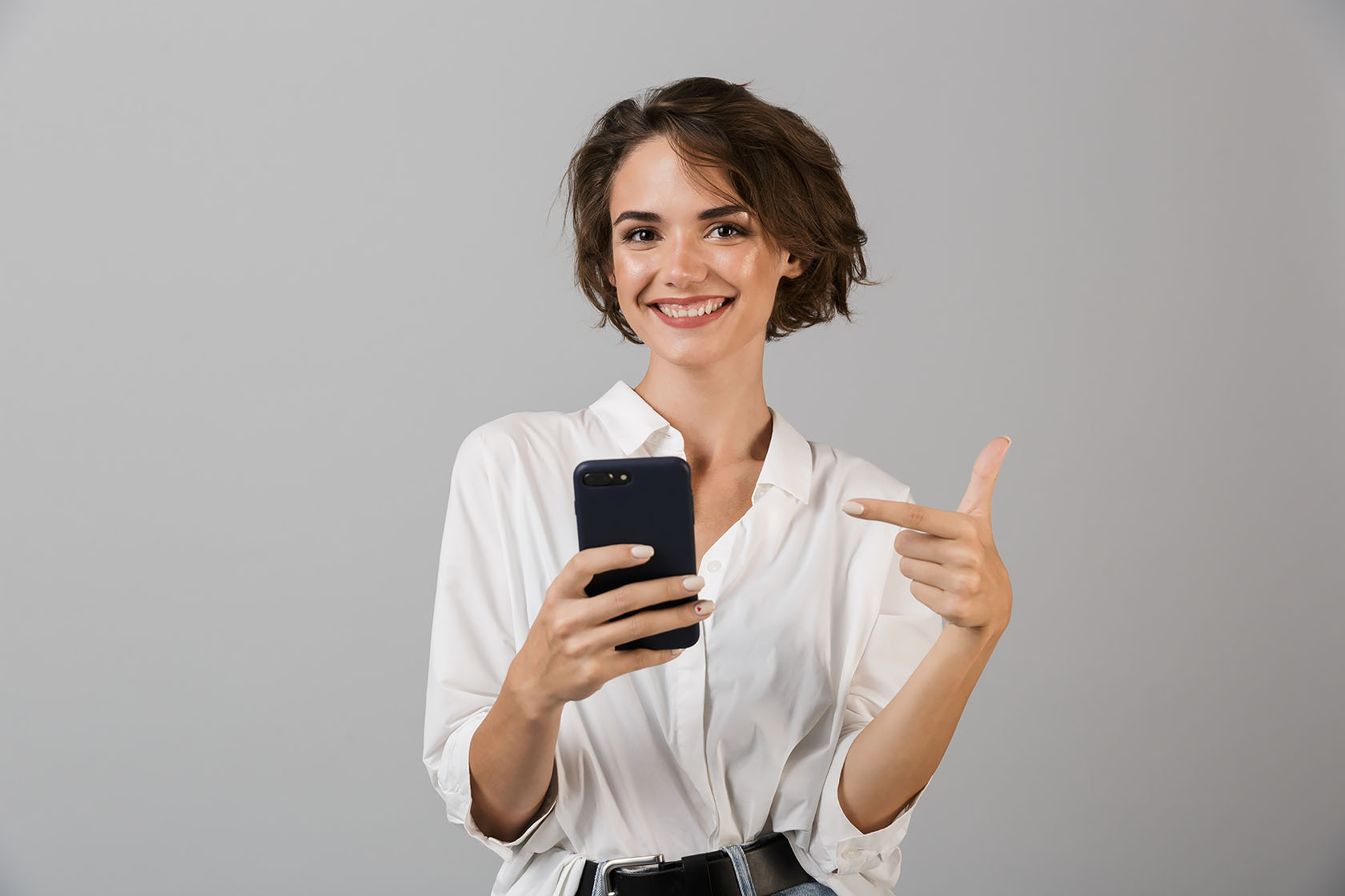 Young Business woman using mobile Phone on White background