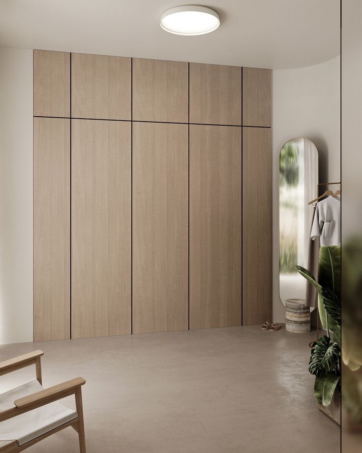 Минималистичный декор, который дополнен гладкими панелями из МДФ в натуральном дубовом тоне.