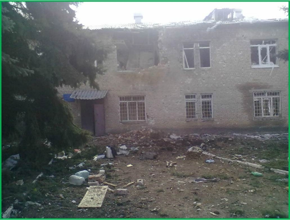 Разрушенное при боевых действиях здание ЭНЦ, 2014 год