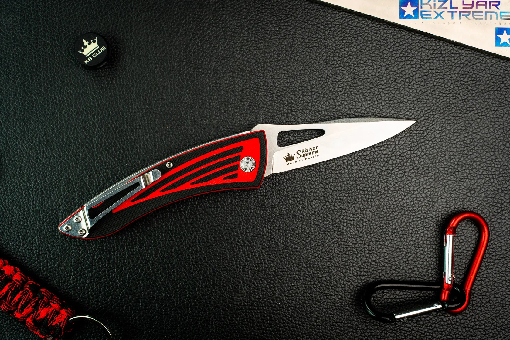 Open Kizlyar Supreme MiG folding knife from the clip side
