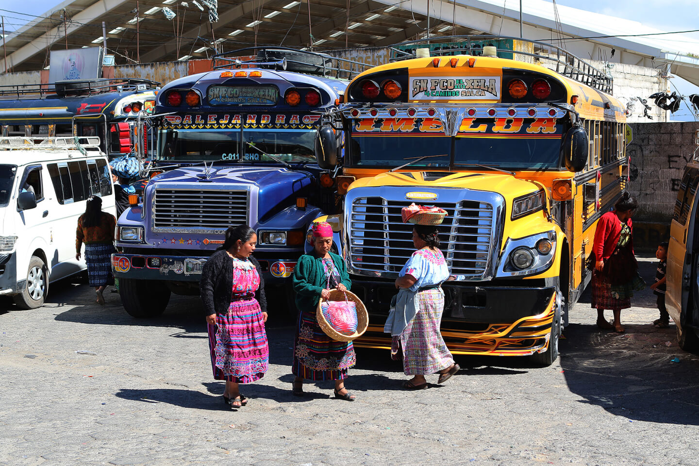 These buses are typical public transport in Guatemala. San Francisco el Alto, Totonicapán Department. 2018.