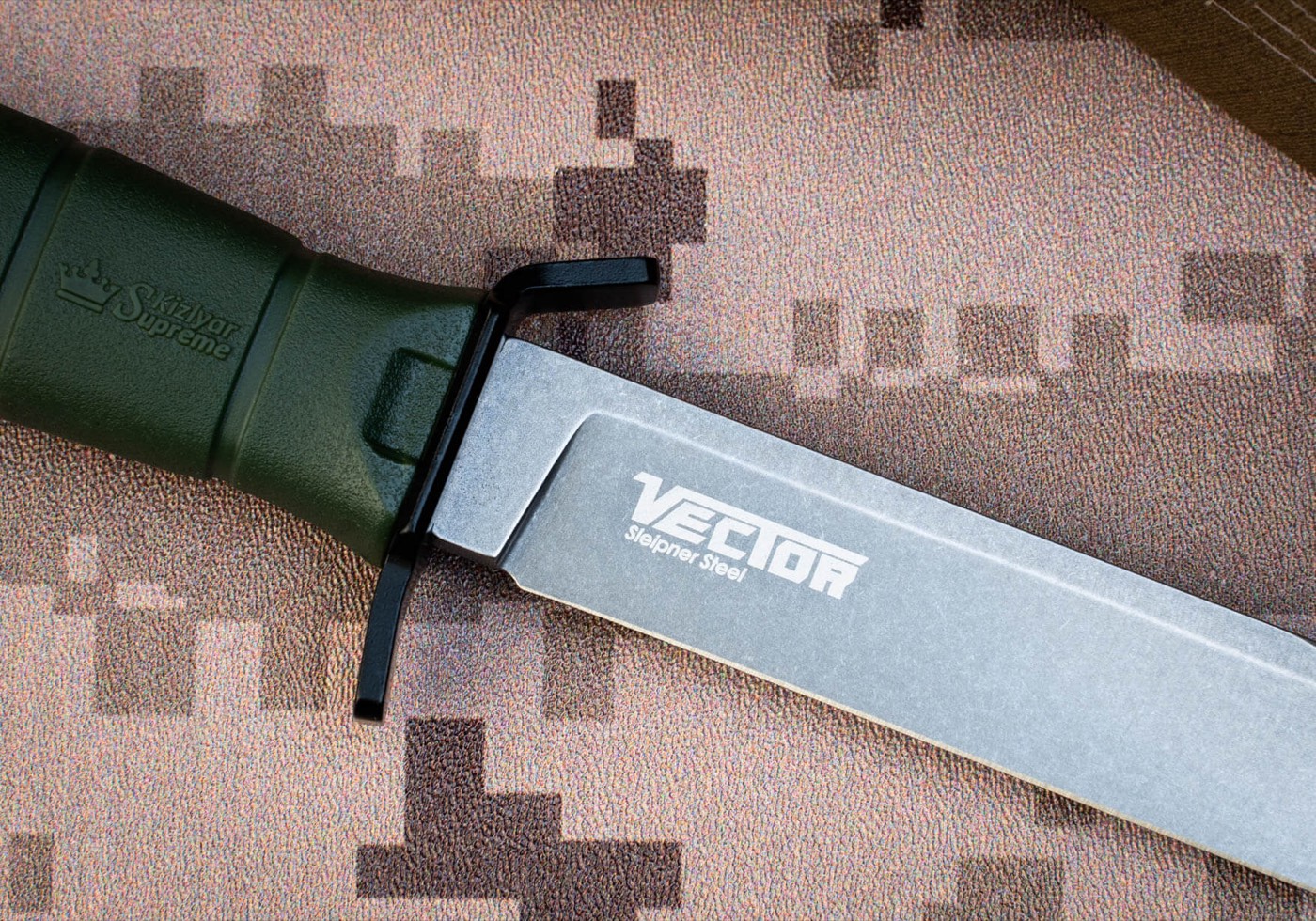 Olive Kizlyar Supreme Vector showing its textured Kraton handle
