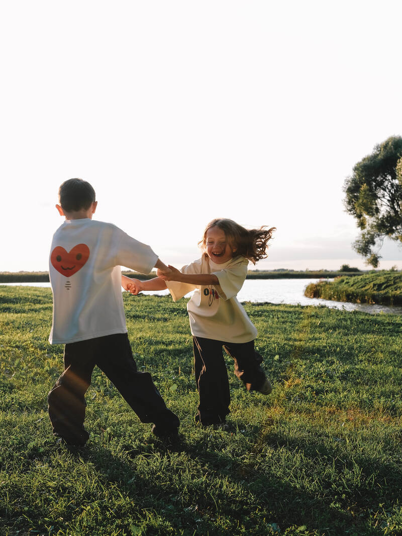 Kids playing by the lake