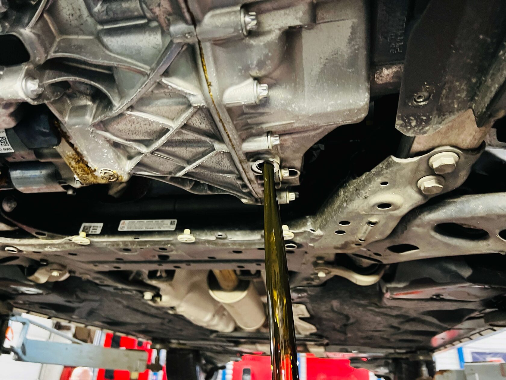 Слив старого масла из робота BMW X2