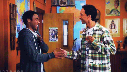 Community: Animated GIF looping Troy and Abed doing their signature handshake/high five.