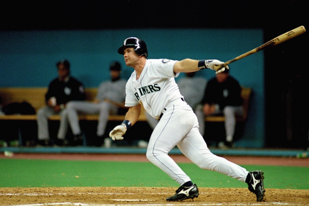 Seattle Mariners' Edgar Martinez watches his sacrifice fly to right field  in the seventh inning against the Oakland Athletics, Friday, Sept. 17,  2004, at Safeco Field in Seattle. The RBI, which scored