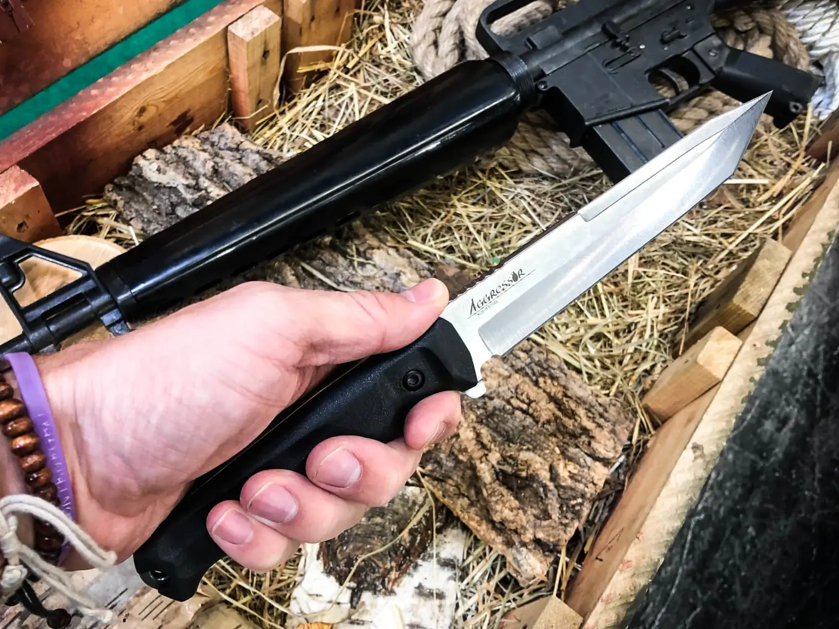 Full-size Aggressor held securely outdoors