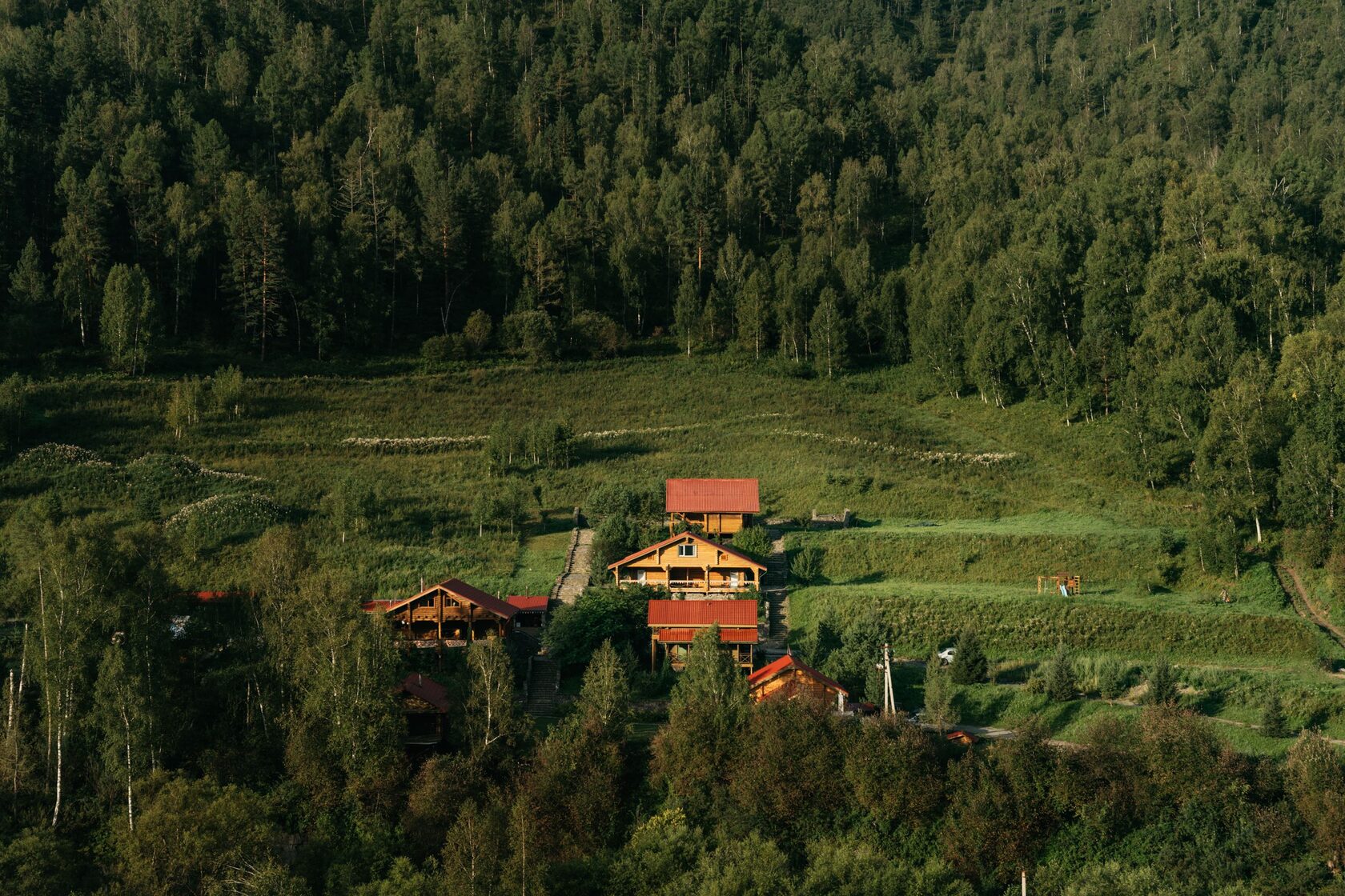 Aerial view of mountain cabins on a hillside