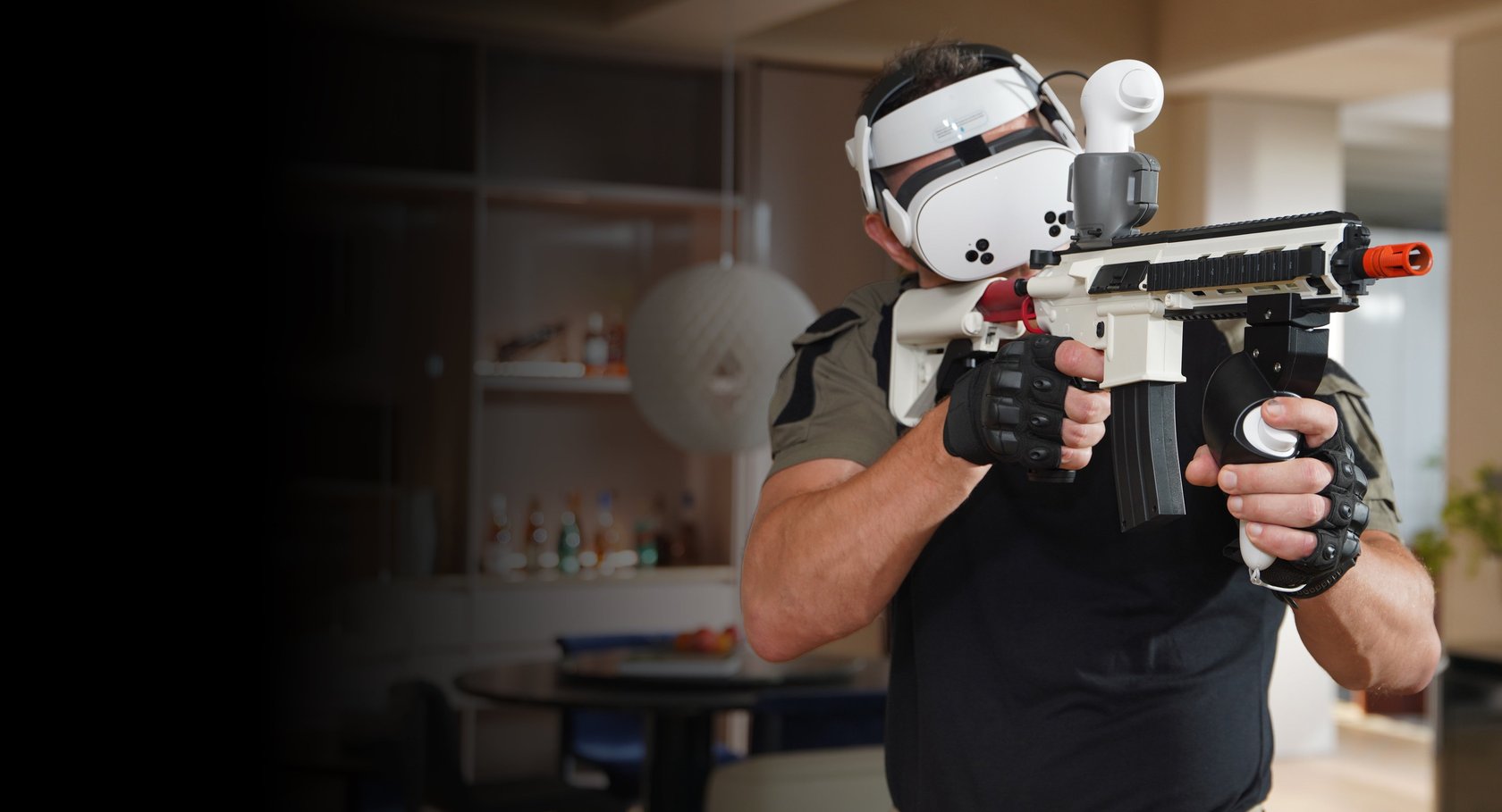 Person in a VR headset with the Wonderfitter M416 training rifle