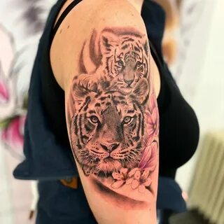 Разнообразие дизайнов татуировок с тигром на руке