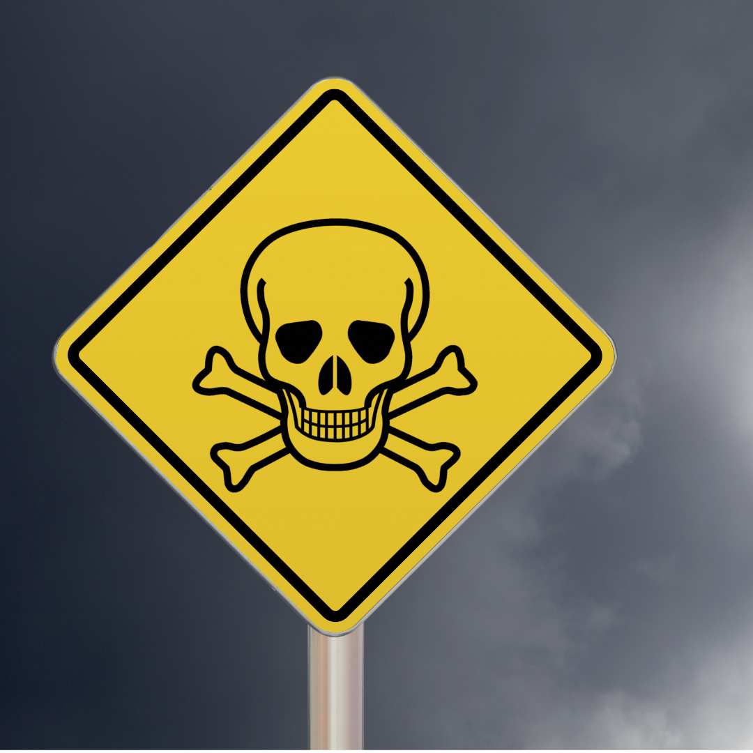a yellow sign with a skull and crossbones on it