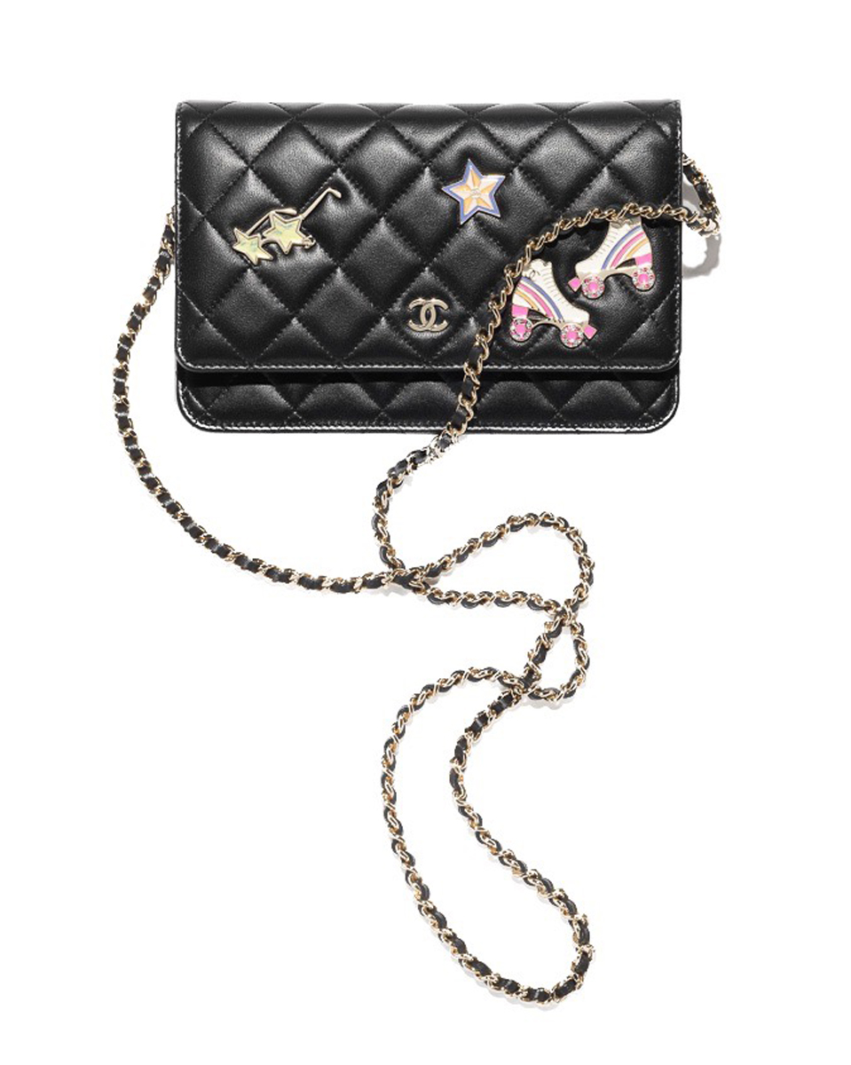 Chanel Mini bag in black leather, charms and metal AP0250