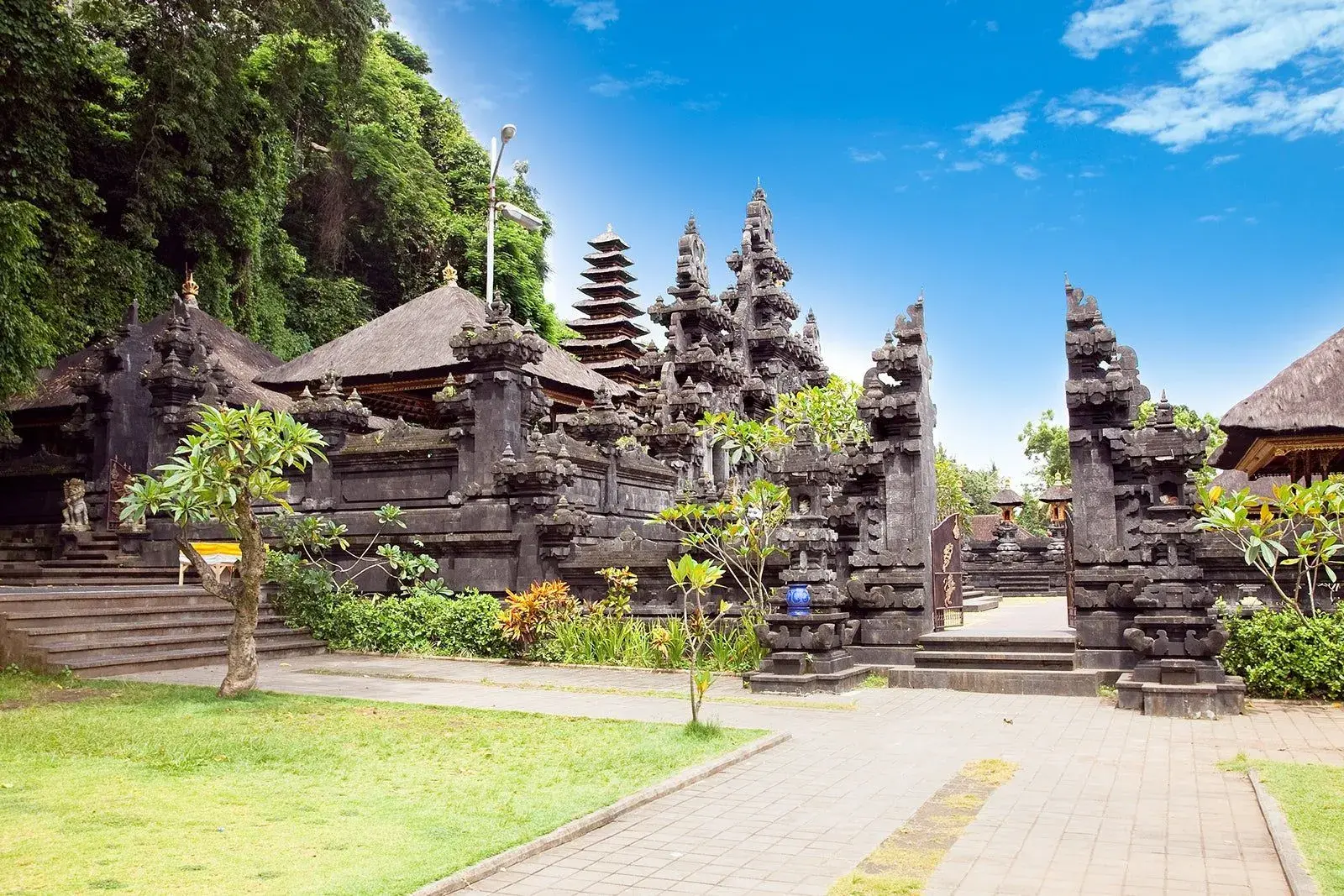 The temple entrance of Pura Goa Lawah, a unique Bali sacred location built at the opening of a bat-filled cave.