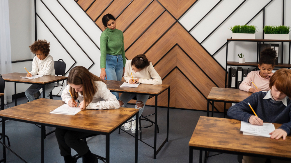 The teacher is checking students in the classroom.