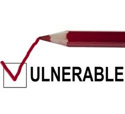 The word vulnerable with a red pencil making a check in the box as a v