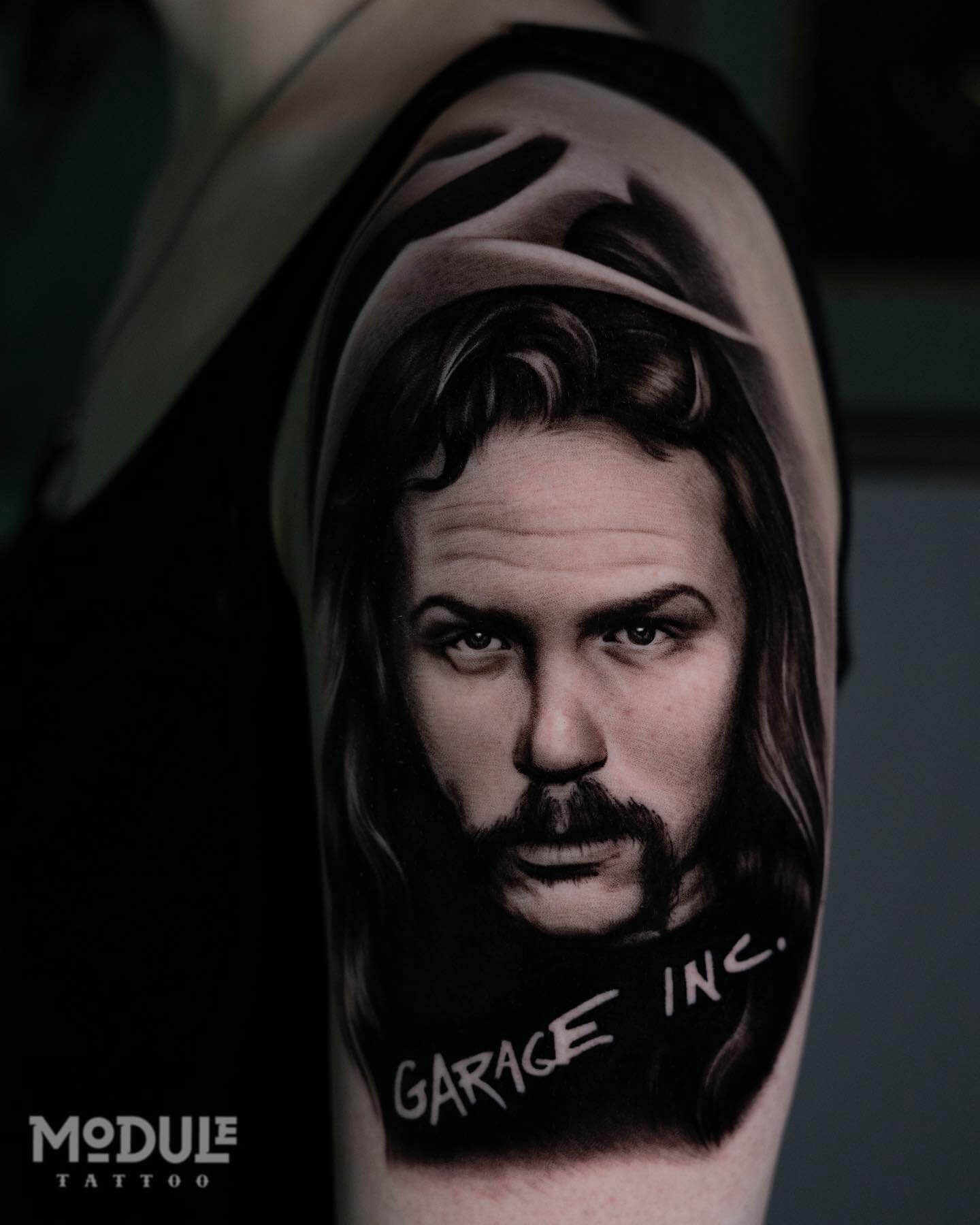 Tattoo on the shoulder, black and white realistic portrait of Metallica vocalist Hetfield, by Rinat Mingazdinod , Los Angeles