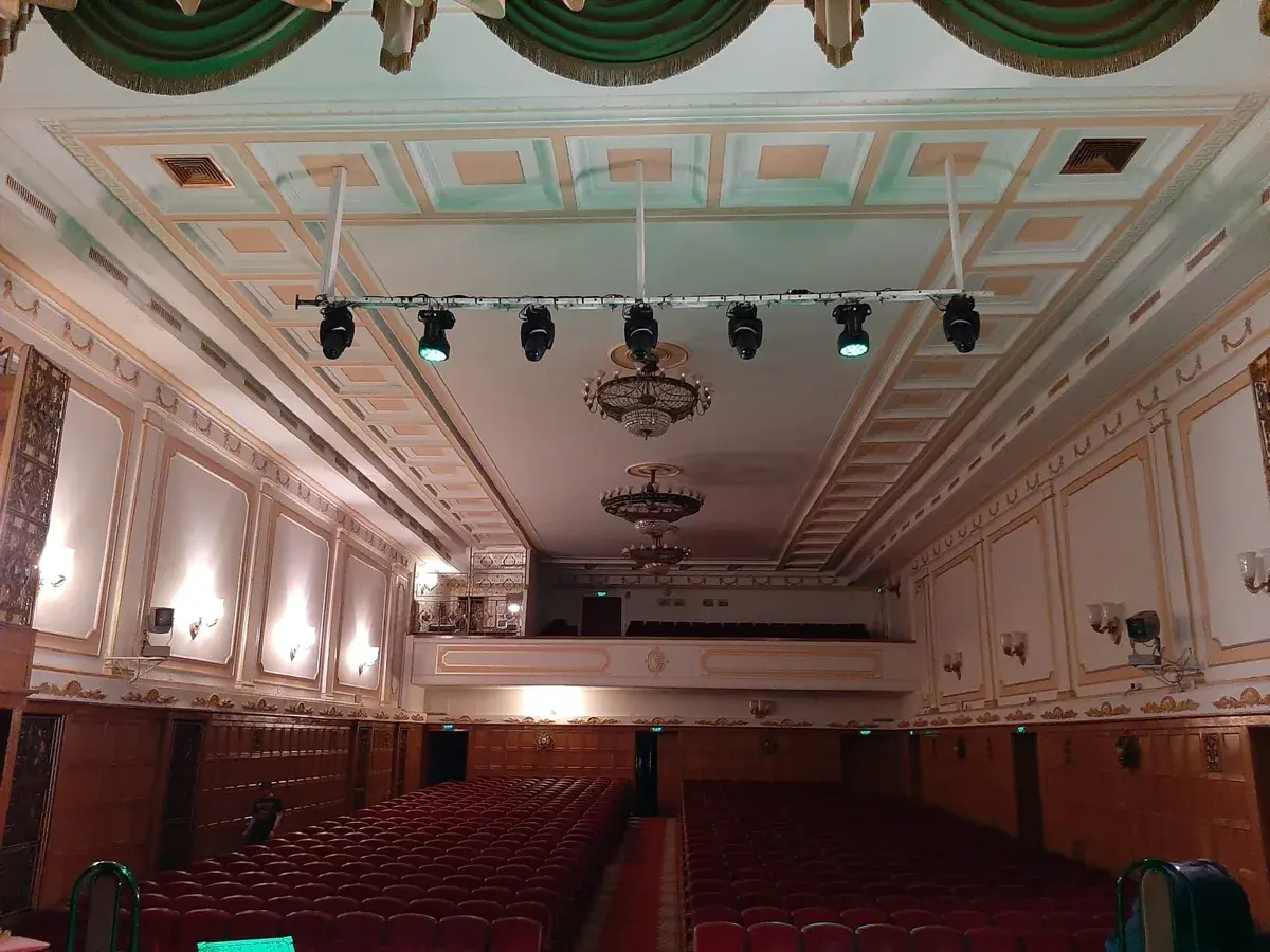 A real Umvek project: installed stage lighting fixtures in an auditorium