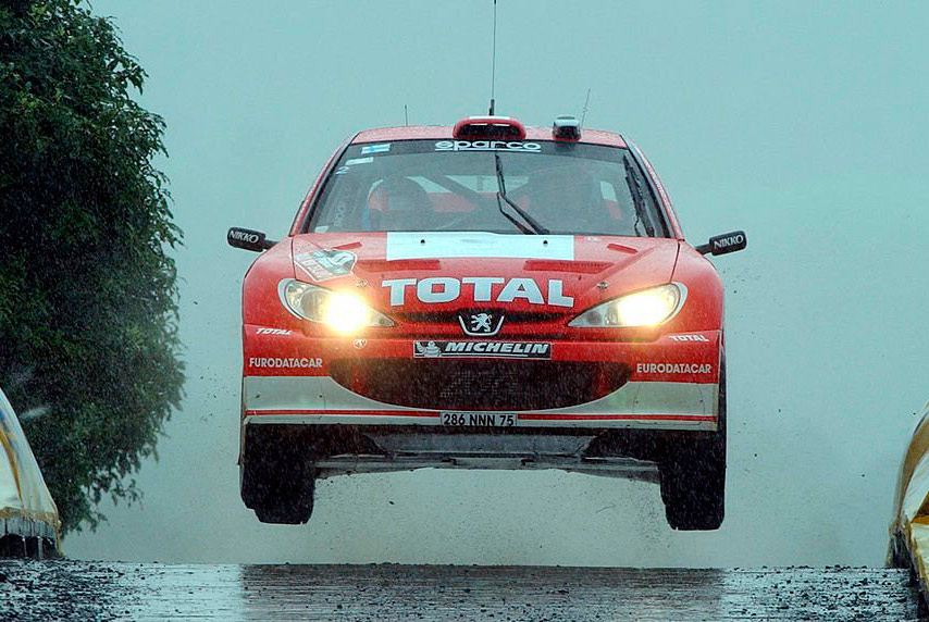 Маркус Гронхольм и Тимо Раутиайнен, Peugeot 206 WRC (286 NNN 75), ралли Новая Зеландия 2003