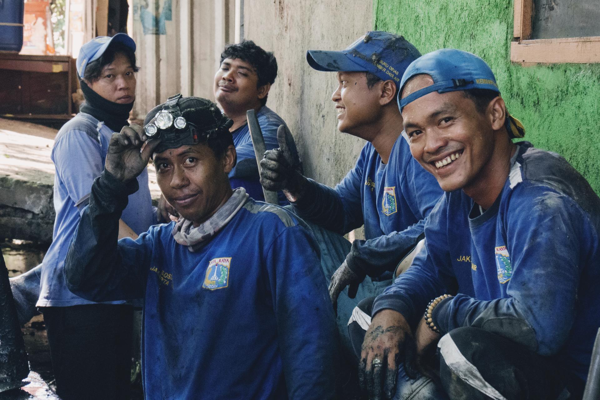 Indonesia | Abyan Madani. A member of Jakarta’s “Blue Troops,” a municipal unit responding to floods and clearing water channels, poses during daily operations.