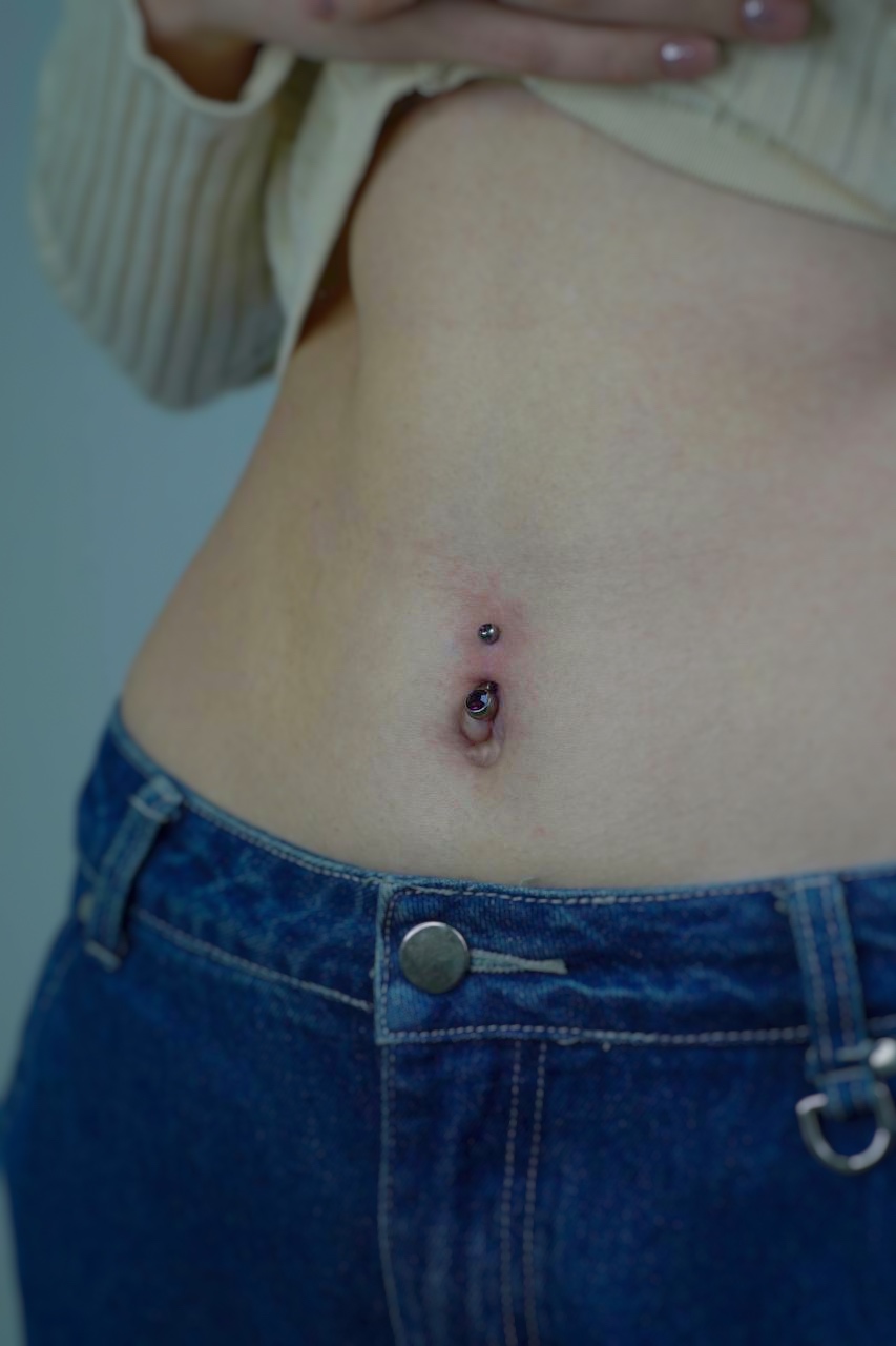 Виды проколов пупка